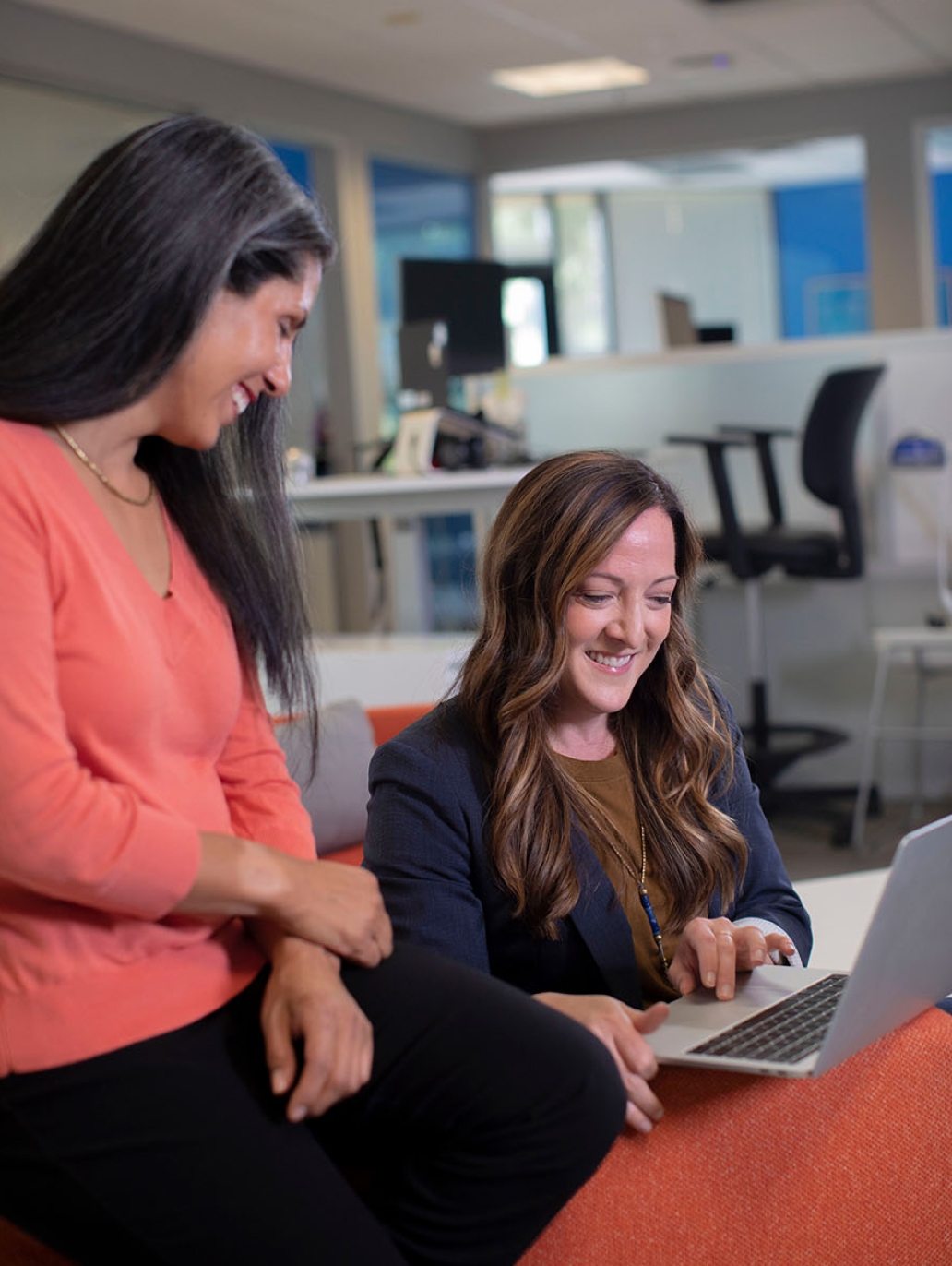 Coworkers collaborating at their desk